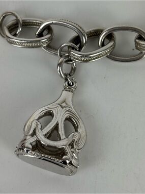 Antique Art Nouveau Chrome Watch Fob Charm.